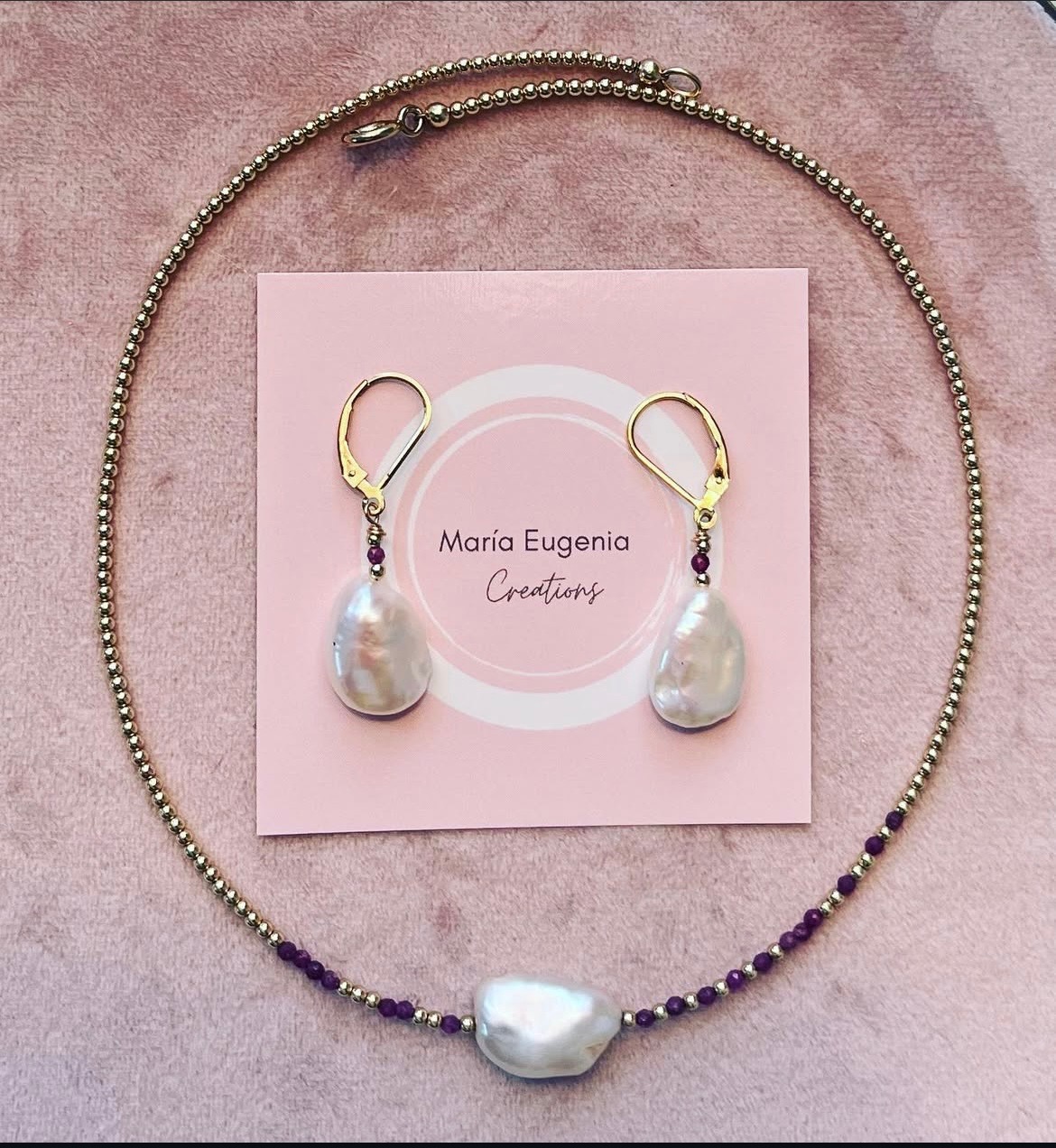 Earrings category image featuring pearl drop earrings and matching necklace